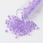 Skleněný rokajl - 11/0 - 2,3 x 1,5 mm - průhledný s fialovým středem - třída A -1 g