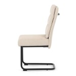 Židle jídelní, taštičkové pružiny v sedáku, madlo na opěráku, krémová látka, černý kov