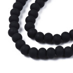 Korálky z polymeru - 7 mm x 5,5 mm - černé - 10ks