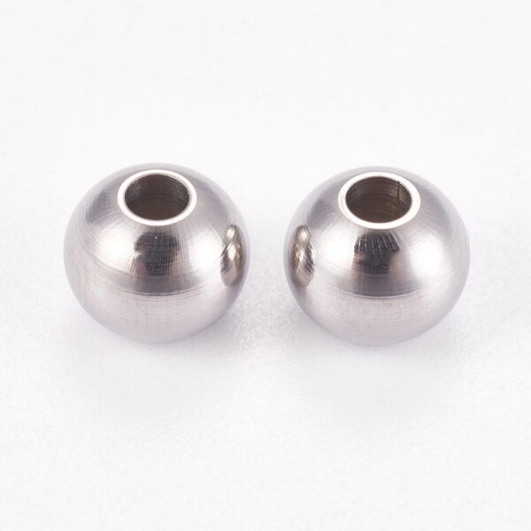 Korálek z nerezové oceli se širokým průvlekem - platinový - 6 x 4,8 mm - 1 ks