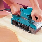 Makita 9404J / Pásová bruska / 1010W / 610 x 100 mm / systainer (9404J)