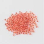 Skleněný rokajl - 11/0 - 2,3 x 1,5 mm - průhledný s lososovým středem - třída A -1 g